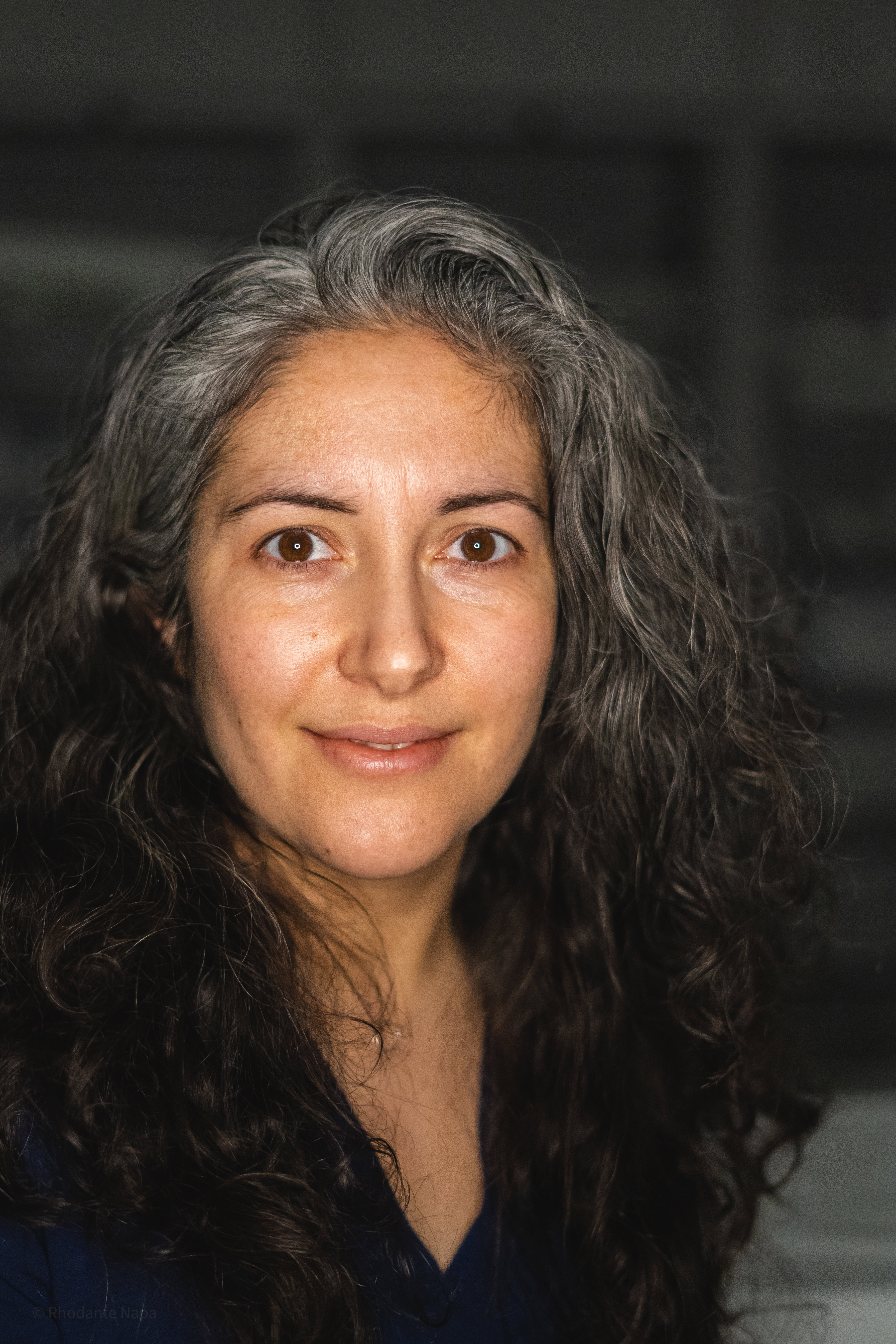 A head and shoulders portrait of a woman, Dr Sammy Rostampour, an interventional radiologist