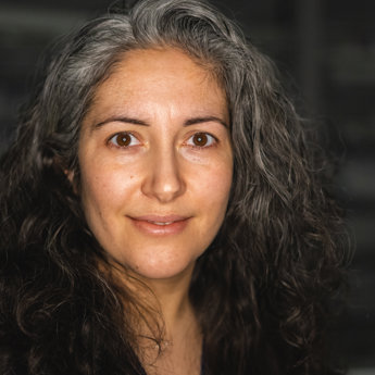 A head and shoulders portrait of a woman, Dr Sammy Rostampour, an interventional radiologist