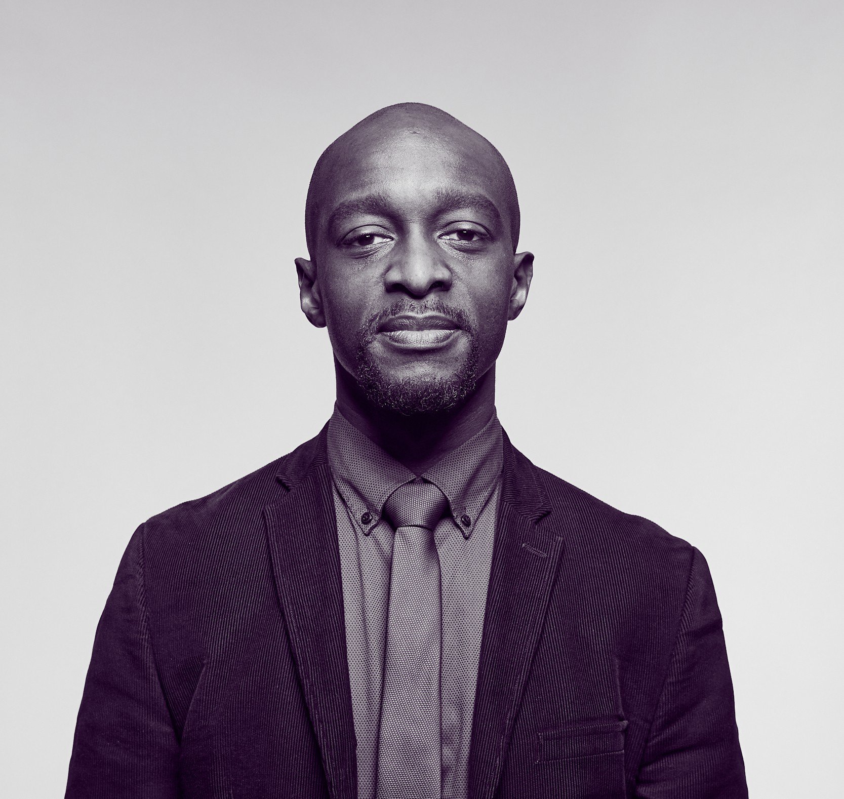 Head and shoulders portrait of Dr John Adu Michael Wharley