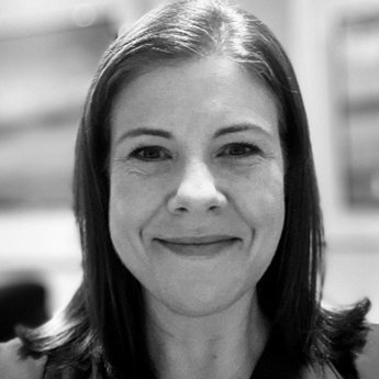 A head and shoulders portrait of a woman, Dr Hannah Stockley, an interventional radiologist